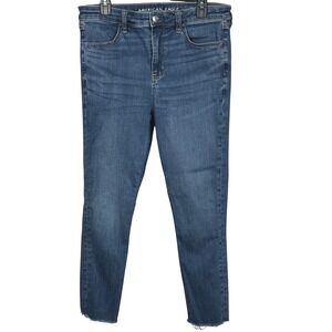 American Eagle High Rise Jegging Medium Wash Next Level Stretch Raw Hem Size 14R